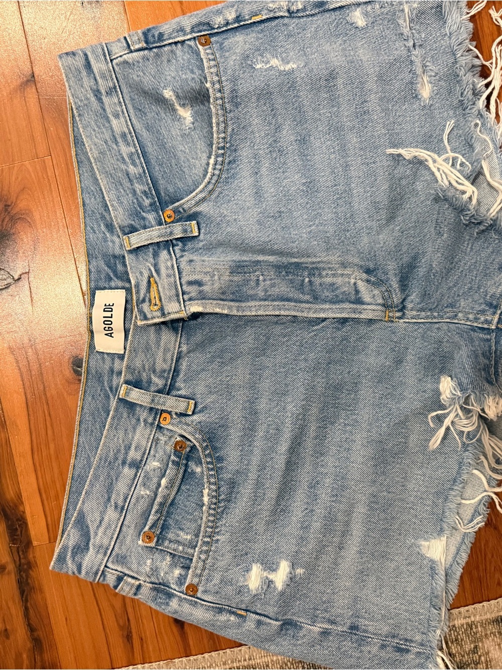 Agolde Light Wash Distressed Denim Cutoff Shorts